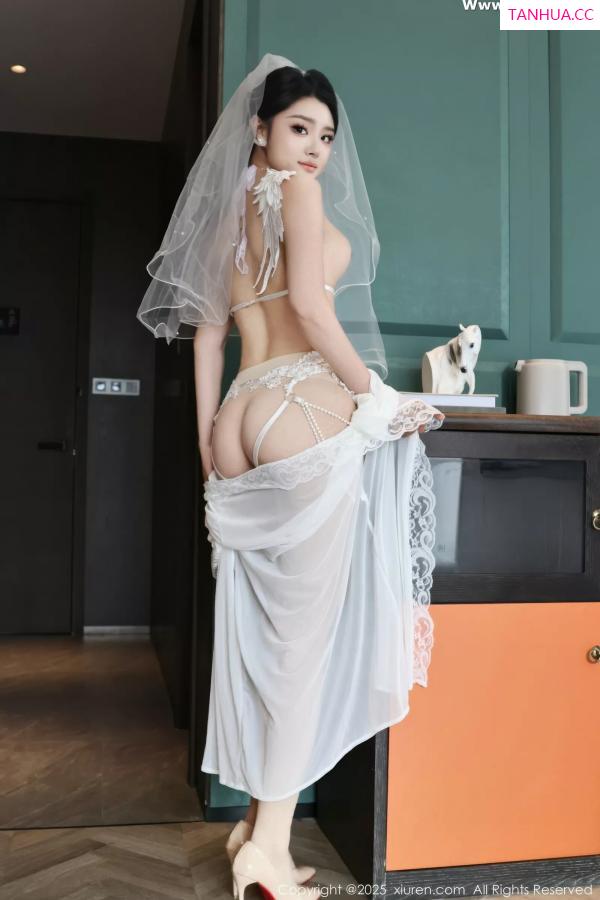   [XiuRen]高清写真图 2025.07.18 No.10559 糯梨子 白色婚纱第12张图片